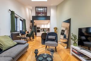 Televízia a/alebo spoločenská miestnosť v ubytovaní Toscana - Luxury Duplex Rouen