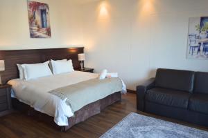 Postel nebo postele na pokoji v ubytování BergWood Inn