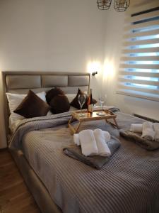 Ένα ή περισσότερα κρεβάτια σε δωμάτιο στο Luxora Zlatibor Central Residence