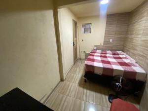 Ένα ή περισσότερα κρεβάτια σε δωμάτιο στο Casa Itacaré 1