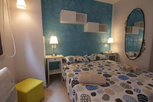 Postel nebo postele na pokoji v ubytování Rosemary Charming Rooms