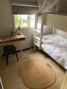 Postel nebo postele na pokoji v ubytování Het Landje in Friesland