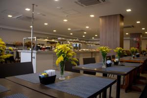 Restoran atau tempat lain untuk makan di Centro Sul Express Hotel