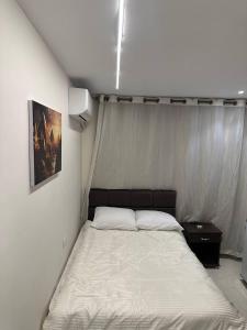 Voodi või voodid majutusasutuse Sun 3 Pyramids Inn toas
