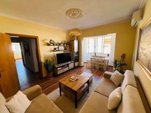 Μια τηλεόραση ή/και κέντρο ψυχαγωγίας στο Cozy central apartment