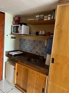 A cozinha ou cozinha compacta de Maria Leuça Teixeira Duarte - AYAMBRA RESIDENCIAL HOTEL Avenida Vinte e Cinco de Dezembro, 525 Praia do Meio Natal RN