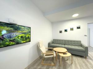 Χώρος καθιστικού στο Riverside Lindas Apartment close to Kalinderu