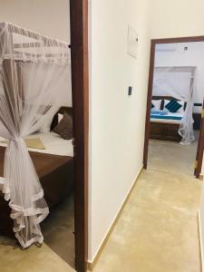 Postel nebo postele na pokoji v ubytování Orana Villa