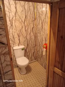 Ένα μπάνιο στο Koshoi Ata guest house