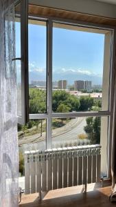 Photo de la galerie de l'établissement Лучший вид на горы из уютной квартиры, à (( Gornyy Gigant ))