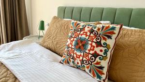 Photo de la galerie de l'établissement Лучший вид на горы из уютной квартиры, à (( Gornyy Gigant ))