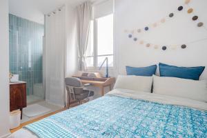 Ένα ή περισσότερα κρεβάτια σε δωμάτιο στο Chambre chez l'habitant - Arty & Élégante - SDB privée