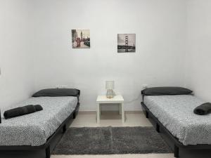 Łóżko lub łóżka w pokoju w obiekcie Low Island House