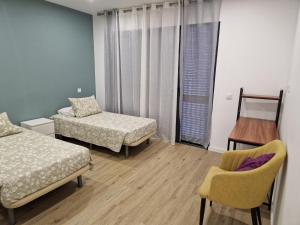 Postel nebo postele na pokoji v ubytování C - Delightful 2 bedroom Vacation home