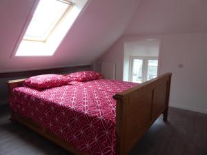 Un pat sau paturi într-o cameră la Boerderij de Borgh