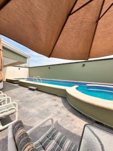 Bazén v ubytování Hotel Centro Apatzingán nebo v jeho okolí + 8 fotografií