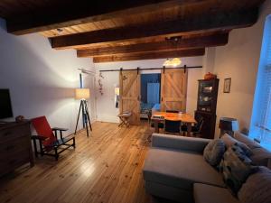 Posezení v ubytování "De Walvisch", appartement in authentieke boerderij