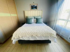 Postel nebo postele na pokoji v ubytování 12th La Maison + 8 fotografií