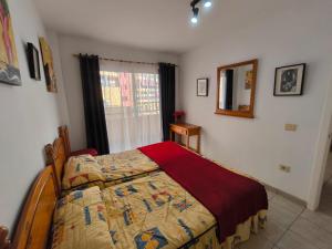 En eller flere senge i et værelse på Jardín Marino + 137 billeder