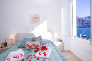 Postel nebo postele na pokoji v ubytování Villa Larius Balcone