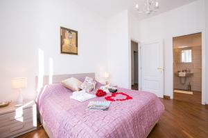 Postel nebo postele na pokoji v ubytování Villa Larius Balcone
