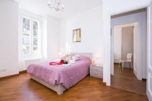 Postel nebo postele na pokoji v ubytování Villa Larius Balcone