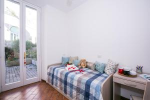 Postel nebo postele na pokoji v ubytování Villa Larius Balcone
