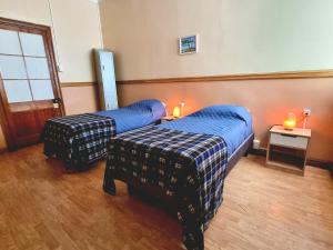 Postel nebo postele na pokoji v ubytování Gauchito Patagón