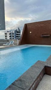 Bazén v ubytování Loft 2 Edf celita Franca Business e flat nebo v jeho okolí