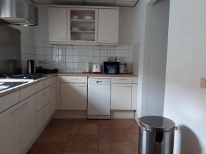 Kuchyň nebo kuchyňský kout v ubytování Room in the center of Enschede
