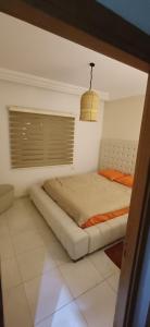 Postel nebo postele na pokoji v ubytování Appartement 1ere étage jardin carthage tunis