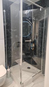 Kúpeľňa v ubytovaní Apartament Deluxe Centrum Warszawa