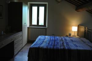 Posteľ alebo postele v izbe v ubytovaní Agriturismo Valdappio