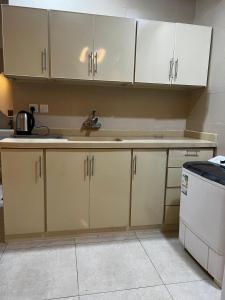 مطبخ أو مطبخ صغير في شقق فاخرة Luxury apartments