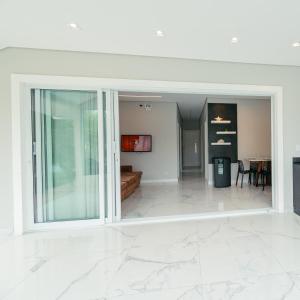 Fotografie z fotogalerie ubytování M&M House - Casa com Piscina e Ar Condicionado em Matinhos v destinaci Matinhos