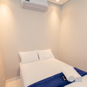Postel nebo postele na pokoji v ubytování M&M House - Casa com Piscina e Ar Condicionado em Matinhos