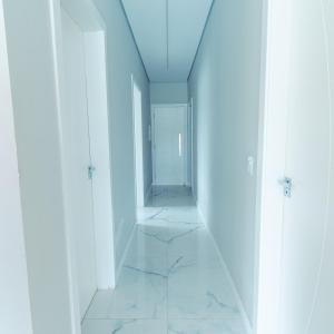 Fotografie z fotogalerie ubytování M&M House - Casa com Piscina e Ar Condicionado em Matinhos v destinaci Matinhos