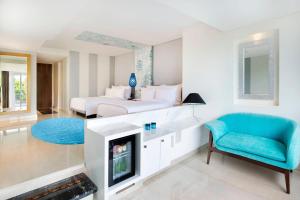 Postel nebo postele na pokoji v ubytování Le Meridien Bali Jimbaran
