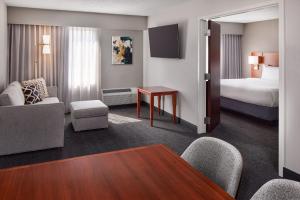Postel nebo postele na pokoji v ubytování Courtyard by Marriott Fort Collins