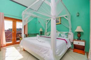 Una cama o camas en una habitación de Tropical Paradise View