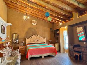 Postel nebo postele na pokoji v ubytování Casa del Sol