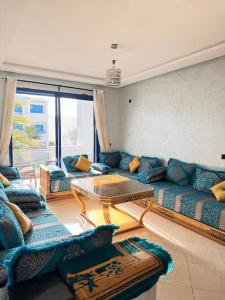Posezení v ubytování Bel Appartement vue piscine