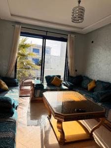 Posezení v ubytování Bel Appartement vue piscine