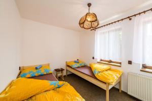 Postel nebo postele na pokoji v ubytování Apartmány Havana
