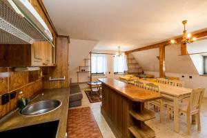 Kuchyň nebo kuchyňský kout v ubytování Apartmány Havana