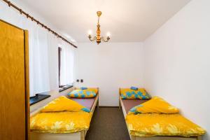 Postel nebo postele na pokoji v ubytování Apartmány Havana
