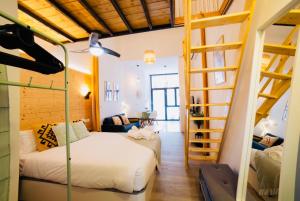 Postel nebo postele na pokoji v ubytování B2 Verdeguer - Cozy Loft close to the beach