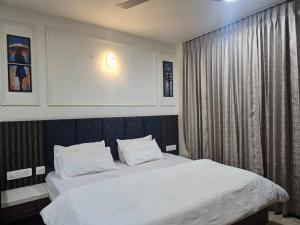 Postel nebo postele na pokoji v ubytování The Blue Moon of Josephine + 26 fotografií