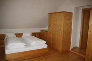 Кровать или кровати в номере Haus Johannes