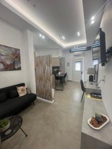 TV a/nebo společenská místnost v ubytování Stampalia Luxury Studios